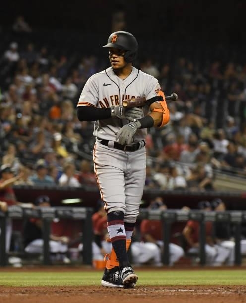 Thairo Estrada of the San Francisco Giants gets ready to step into the batters box against the Arizona Diamondbacks at Chase Field on July 02, 2021...