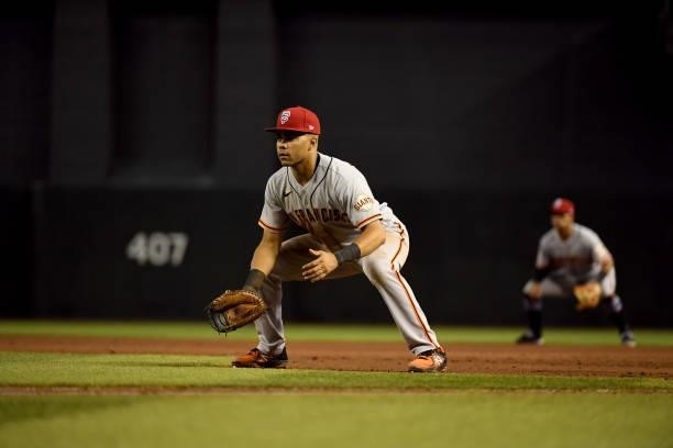 LaMonte Wade of the San Francisco Giants gets ready to make a play at first base against the Arizona Diamondbacks at Chase Field on July 02, 2021 in...