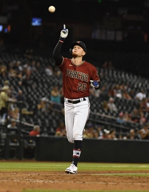 Pavin Smith of the Arizona Diamondbacks reacts after hitting a home run against the San Francisco Giants at Chase Field on July 02, 2021 in Phoenix,...