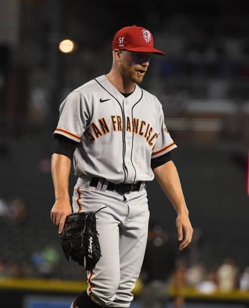James Sherfy of the San Francisco Giants reacts after giving up a home run to Pavin Smith of the Arizona Diamondbacks at Chase Field on July 02, 2021...