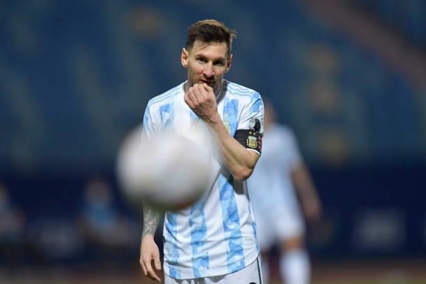 Lionel Messi of Argentina looks at the ball during a quarter-final match of Copa America Brazil 2021 between Argentina and Ecuador at Estadio...