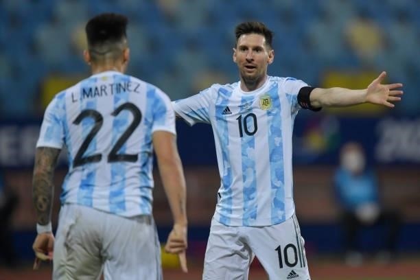 Lautaro Martinez of Argentina celebrates with teammate Lionel Messi after scoring the second goal of his team during a quarter-final match of Copa...