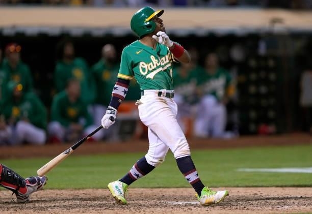 Tony Kemp of the Oakland Athletics hits a walk-off sacrifice fly scoring Seth Brown to defeat the Boston Red Sox 7-6 in the bottom of the 12th inning...
