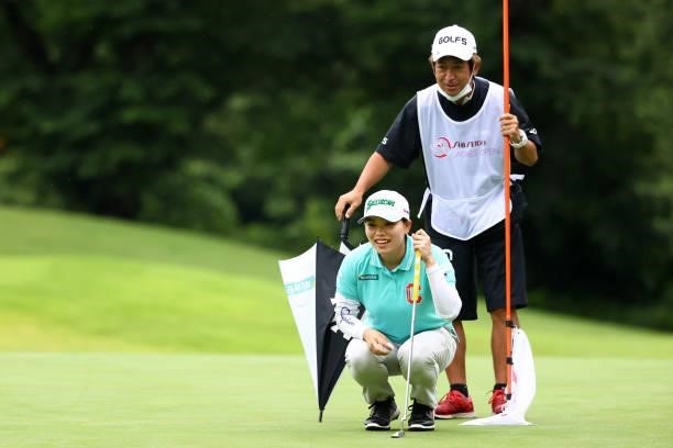 Minami Katsu of Japan lines up a putt on the 1st green during the final round of the Shiseido Ladies Open at Totsuka Country Club on July 4, 2021 in...