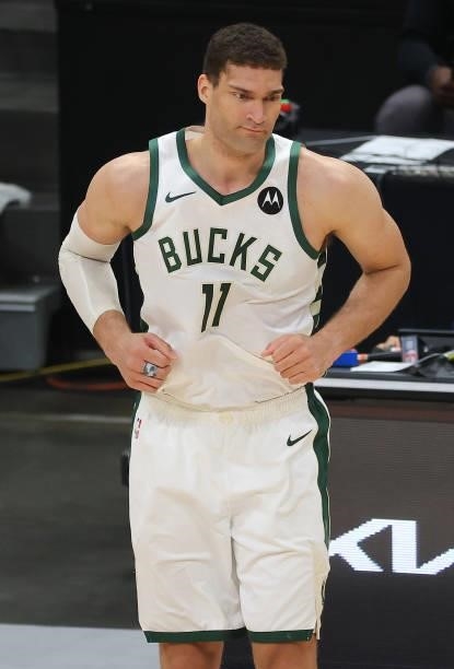 Brook Lopez of the Milwaukee Bucks reacts after a basket against the Atlanta Hawks during the first half in Game Six of the Eastern Conference Finals...