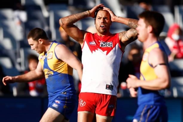 Lance Franklin of the Swans reacts after missing a goal during the round 16 AFL match between Sydney Swans and West Coast Eagles at GMHBA Stadium on...