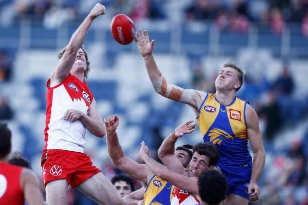 Nick Blakey of the Swans and Oscar Allen of the Eagles contest the ball during the round 16 AFL match between Sydney Swans and West Coast Eagles at...
