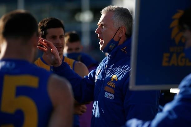 Eagles head coach Adam Simpson speaks to his players during the round 16 AFL match between Sydney Swans and West Coast Eagles at GMHBA Stadium on...