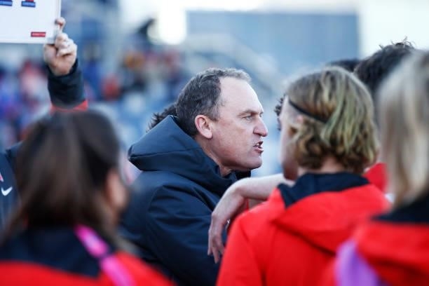 Swans head coach John Longmire speaks to his players during the round 16 AFL match between Sydney Swans and West Coast Eagles at GMHBA Stadium on...