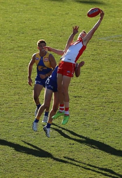 Jordan Dawson of the Swans marks during the round 16 AFL match between Sydney Swans and West Coast Eagles at GMHBA Stadium on July 04, 2021 in...