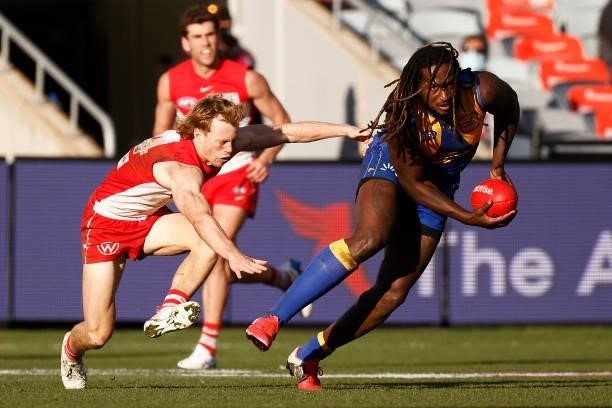 Nic Naitanui of the Eagles runs with the ball during the round 16 AFL match between Sydney Swans and West Coast Eagles at GMHBA Stadium on July 04,...