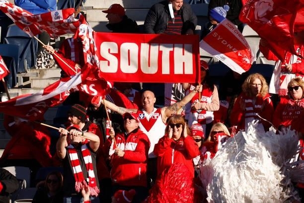 Swans fans show their support during the round 16 AFL match between Sydney Swans and West Coast Eagles at GMHBA Stadium on July 04, 2021 in Geelong,...
