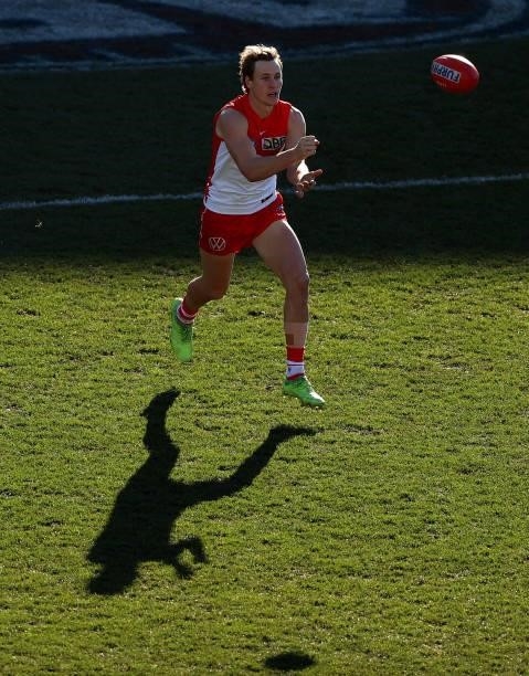 Jordan Dawson of the Swans handballs during the round 16 AFL match between Sydney Swans and West Coast Eagles at GMHBA Stadium on July 04, 2021 in...