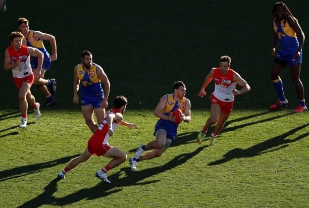 Luke Shuey of the Eagles runs with the ball during the round 16 AFL match between Sydney Swans and West Coast Eagles at GMHBA Stadium on July 04,...