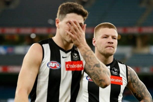 Dejected Jordan De Goey of the Magpies walks off the ground after the round 16 AFL match between Collingwood Magpies and St Kilda Saints at Melbourne...