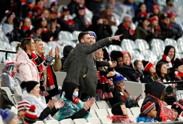 St Kilda fans cheer during the round 16 AFL match between Collingwood Magpies and St Kilda Saints at Melbourne Cricket Ground on July 04, 2021 in...