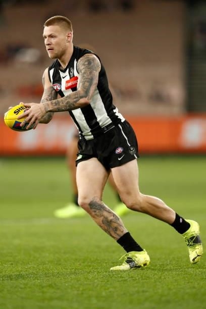 Jordan De Goey of the Magpies runs with the ball during the round 16 AFL match between Collingwood Magpies and St Kilda Saints at Melbourne Cricket...