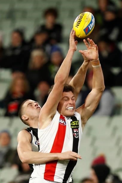 Darcy Cameron of the Magpies spoils Rowan Marshall of the Saints during the round 16 AFL match between Collingwood Magpies and St Kilda Saints at...