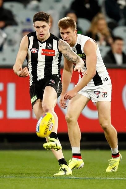 Jack Crisp of the Magpies kicks the ball during the round 16 AFL match between Collingwood Magpies and St Kilda Saints at Melbourne Cricket Ground on...