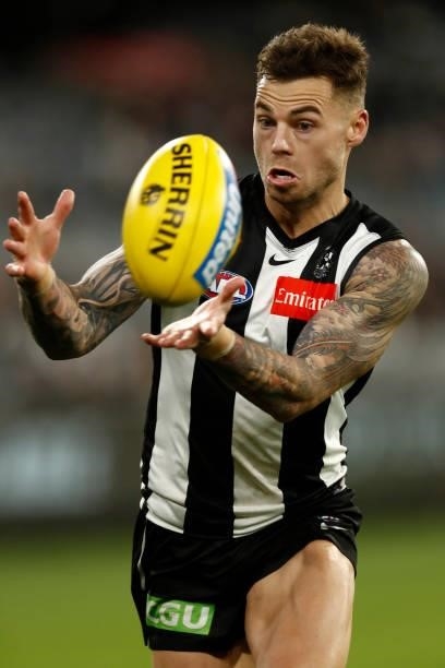 Jamie Elliott of the Magpies chases the ball during the round 16 AFL match between Collingwood Magpies and St Kilda Saints at Melbourne Cricket...