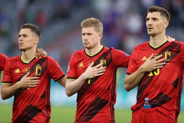 Thorgan Hazard, Kevin de Bruyne and Thomas Meunier of Belgium sing their national anthem prior to the UEFA Euro 2020 Championship Quarter-final match...