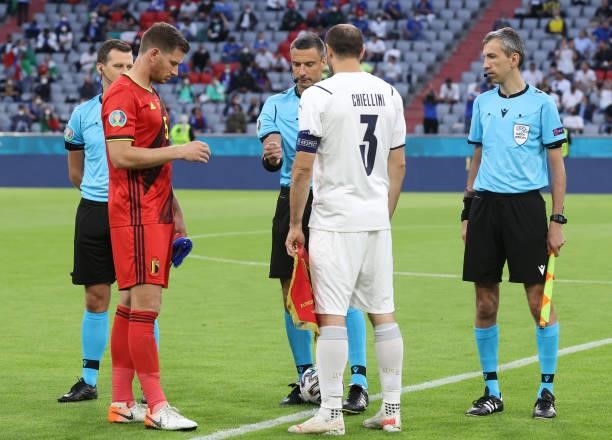 Referee Slavko Vincic performs the coin toss with team captains Jan Verthongen of Belgium and Giorgio Chiellini of Italy prior to the UEFA Euro 2020...