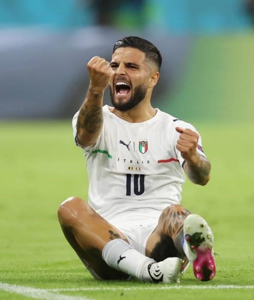 Lorenzo Insigne of Italy celebrates after scoring their side's second goal during the UEFA Euro 2020 Championship Quarter-final match between Belgium...