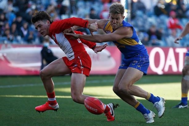 Errol Gulden of the Swans and Brad Sheppard of the Eagles contest the ball during the round 16 AFL match between Sydney Swans and West Coast Eagles...