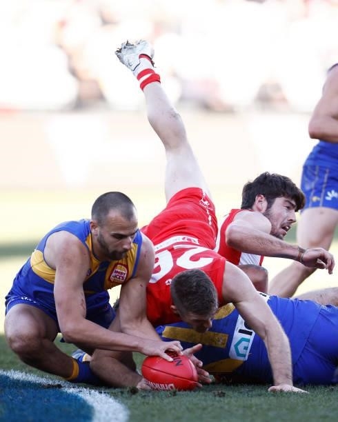 Luke Parker of the Swans and Dom Sheed of the Eagles contest the ball during the round 16 AFL match between Sydney Swans and West Coast Eagles at...