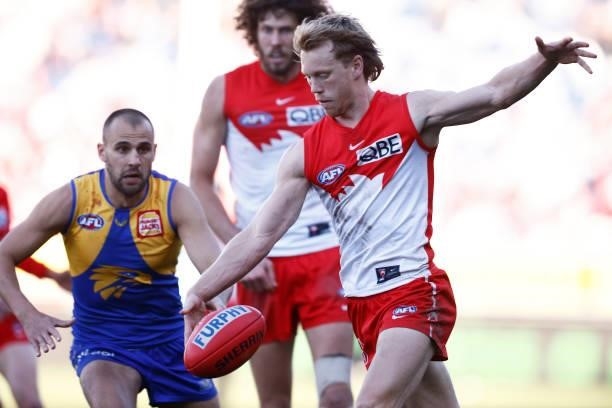Callum Mills of the Swans kicks the ball during the round 16 AFL match between Sydney Swans and West Coast Eagles at GMHBA Stadium on July 04, 2021...
