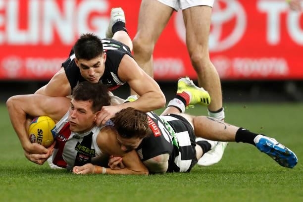 Rowan Marshall of the Saints is tackled during the round 16 AFL match between Collingwood Magpies and St Kilda Saints at Melbourne Cricket Ground on...
