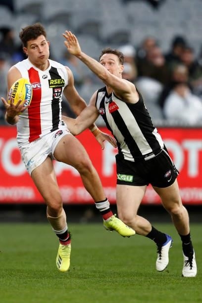 Rowan Marshall of the Saints and Jack Madgen of the Magpies compete during the round 16 AFL match between Collingwood Magpies and St Kilda Saints at...
