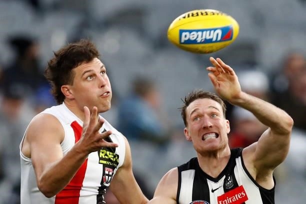 Rowan Marshall of the Saints and Jack Madgen of the Magpies compete during the round 16 AFL match between Collingwood Magpies and St Kilda Saints at...