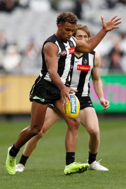 Issac Quaynor of the Magpies kicks the ball during the round 16 AFL match between Collingwood Magpies and St Kilda Saints at Melbourne Cricket Ground...