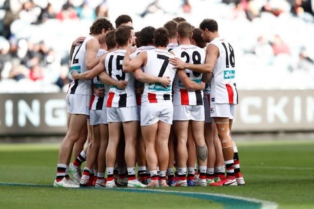 St Kilda players huddle before the round 16 AFL match between Collingwood Magpies and St Kilda Saints at Melbourne Cricket Ground on July 04, 2021 in...