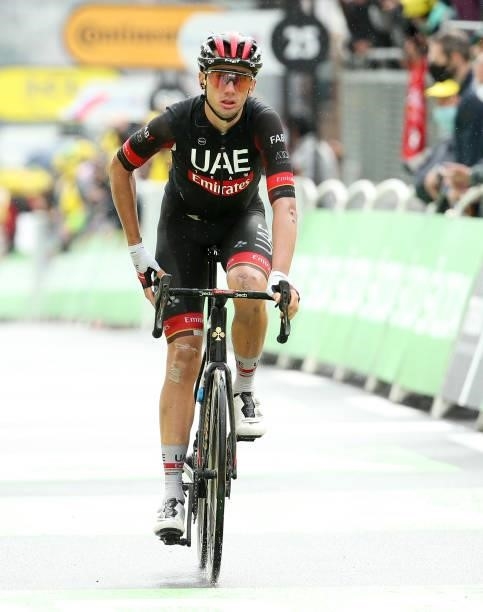 Brandon McNulty of USA and UAE Team Emirates crosses the finish line during stage 8 of the 108th Tour de France 2021, a stage of 151 km between...