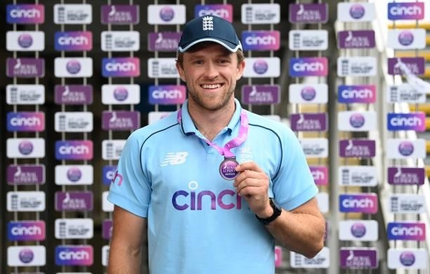 Man of the Series David Willey of England holds up his medal after the third One Day International between England and Sri Lanka at Bristol County...