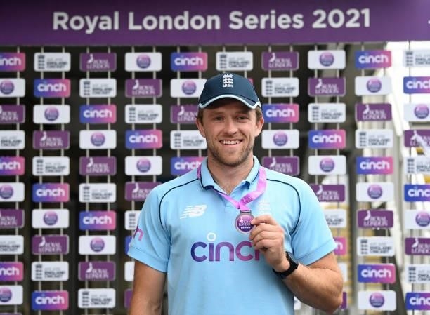 Man of the Series David Willey of England holds up his medal after the third One Day International between England and Sri Lanka at Bristol County...