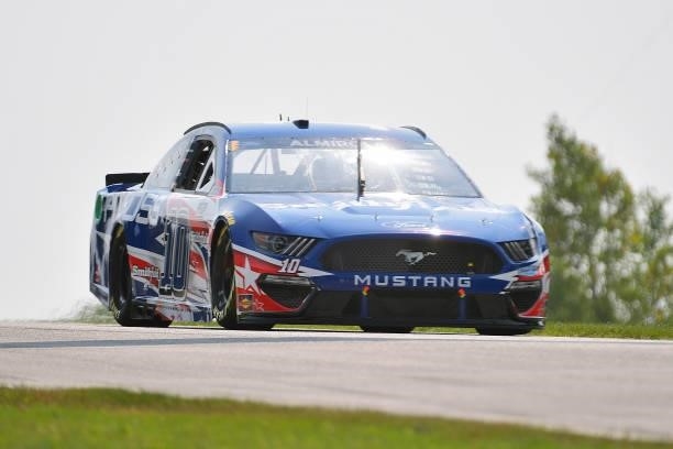 Aric Almirola, driver of the Smithfield/Pit Boss Grills Ford, drives during qualifying for the NASCAR Cup Series Jockey Made in America 250 Presented...