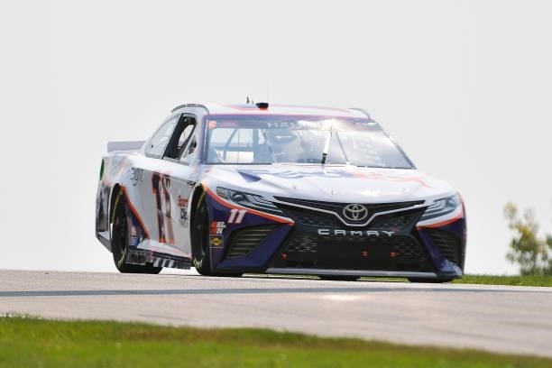 Denny Hamlin, driver of the FedEx Freight Toyota, drives during qualifying for the NASCAR Cup Series Jockey Made in America 250 Presented by Kwik...
