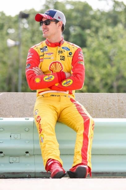 Joey Logano, driver of the Shell Pennzoil Ford, waits on the grid during qualifying for the NASCAR Cup Series Jockey Made in America 250 Presented by...