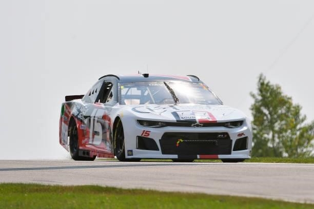James Davison, driver of the Skip Barber Racing School Chevrolet, drives during qualifying for the NASCAR Cup Series Jockey Made in America 250...