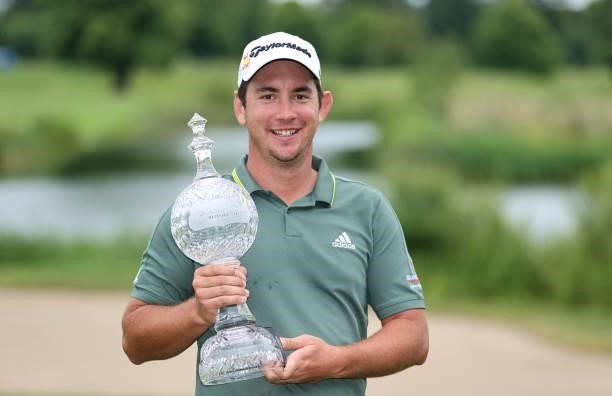 Lucas Herbert of Australia holds the winners trophy after the final round of The Dubai Duty Free Irish Open at Mount Juliet Golf Club on July 04,...