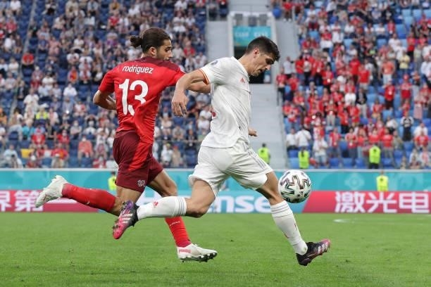 Gerard Moreno of Spain competes for the ball with Ricardo Rodriguez of Switzerland during the UEFA Euro 2020 Championship Quarter-final match between...