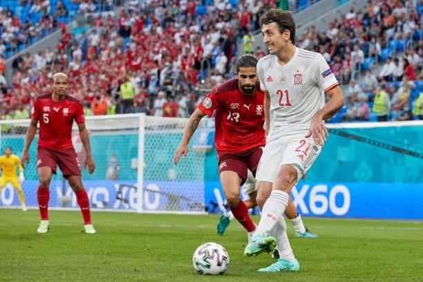 Mikel Oyarzabal of Spain competes for the ball with Ricardo Rodriguez of Switzerland during the UEFA Euro 2020 Championship Quarter-final match...