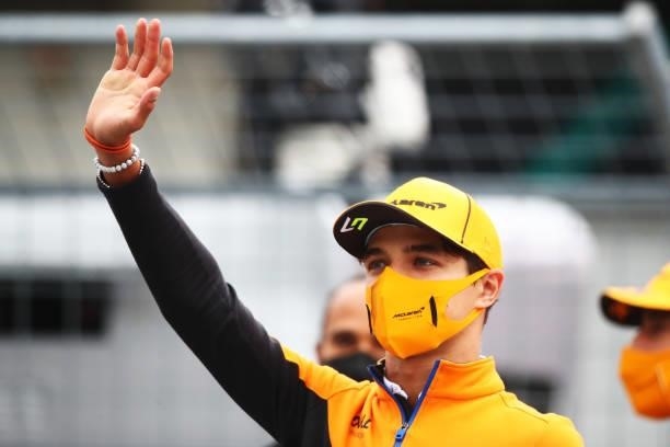 Lando Norris of Great Britain and McLaren F1 waves to the crowd during the drivers parade ahead of the F1 Grand Prix of Austria at Red Bull Ring on...