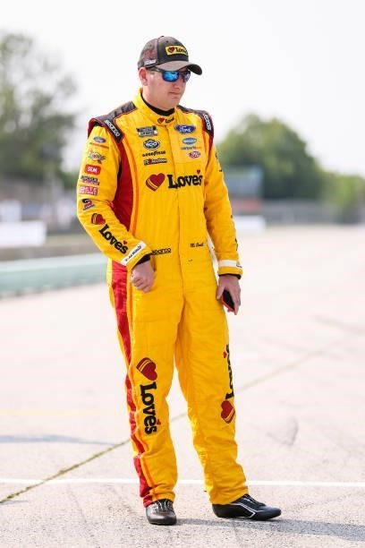 Michael McDowell, driver of the Love's Travel Stops Ford, waits on the grid during qualifying for the NASCAR Cup Series Jockey Made in America 250...
