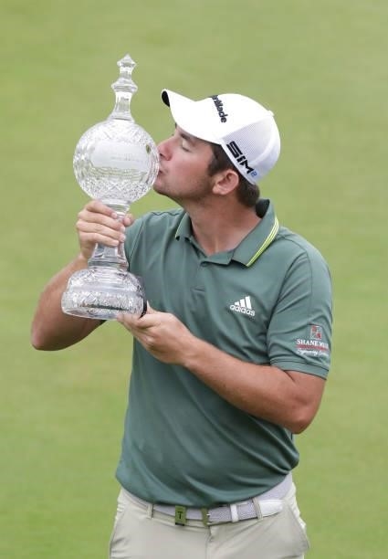 Lucas Herbert of Australia kisses the winners trophy after the final round of The Dubai Duty Free Irish Open at Mount Juliet Golf Club on July 04,...