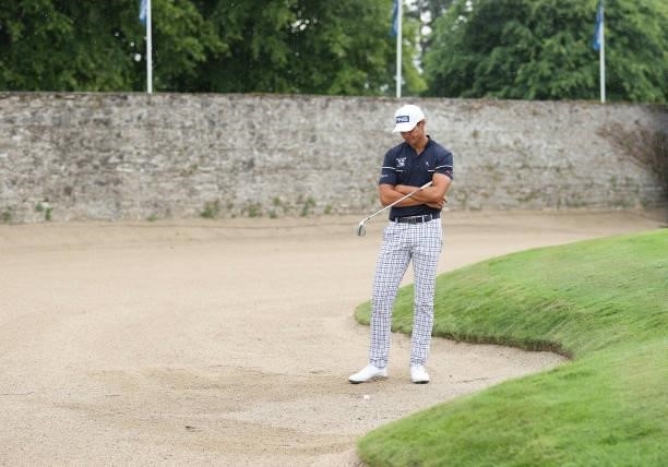 Johannes Veerman of USA ponders his bunker shot on the 16th hole during final round of The Dubai Duty Free Irish Open at Mount Juliet Golf Club on...