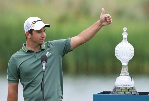 Lucas Herbert of Australia gives the thumbs up to the winners trophy after the final round of The Dubai Duty Free Irish Open at Mount Juliet Golf...